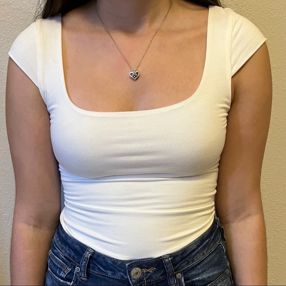 white shirt sleeve body suit